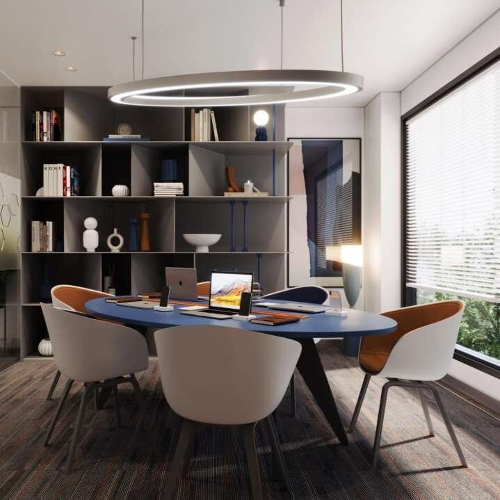 Breakout reading nook with built-in bookshelving and round meeting table
