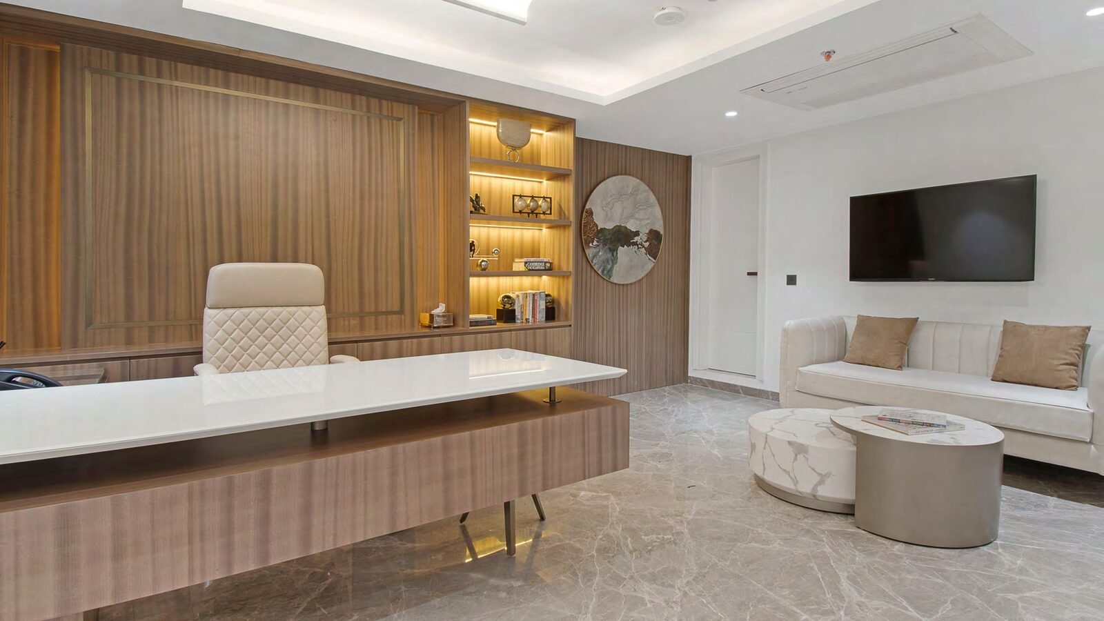 Director's suite with walnut panelling, marble desk and gold accents