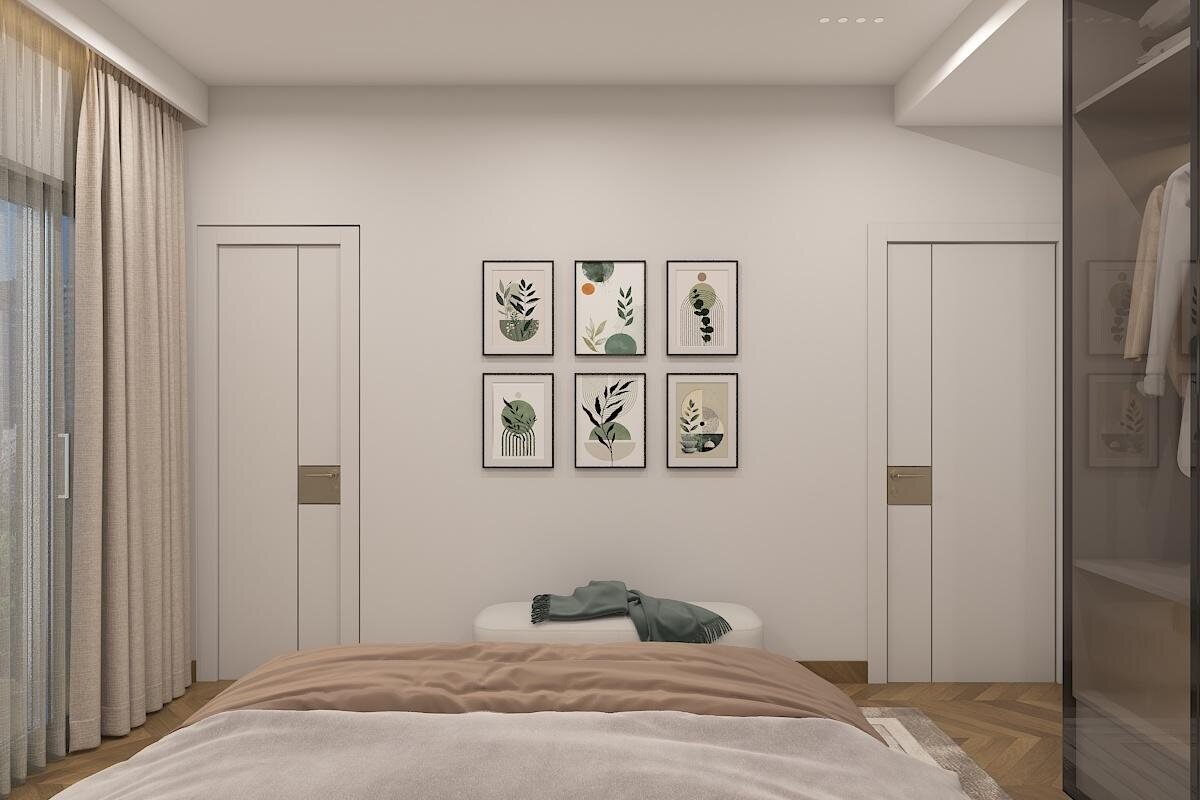 Bedroom with framed botanical prints and wardrobe beyond